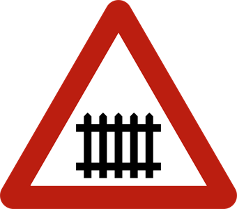 Signal de danger : passage à niveau avec barrières