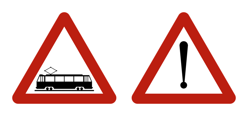 À gauche, croisement de la chaussée par une ou plusieurs voies ferrées ; à droite, danger non défini par un symbole spécial